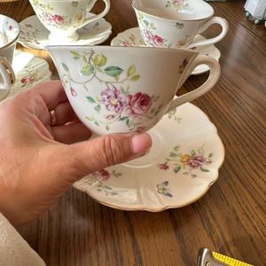 Gracie, China, by coastland imports Tea set with floral and butterfly design.